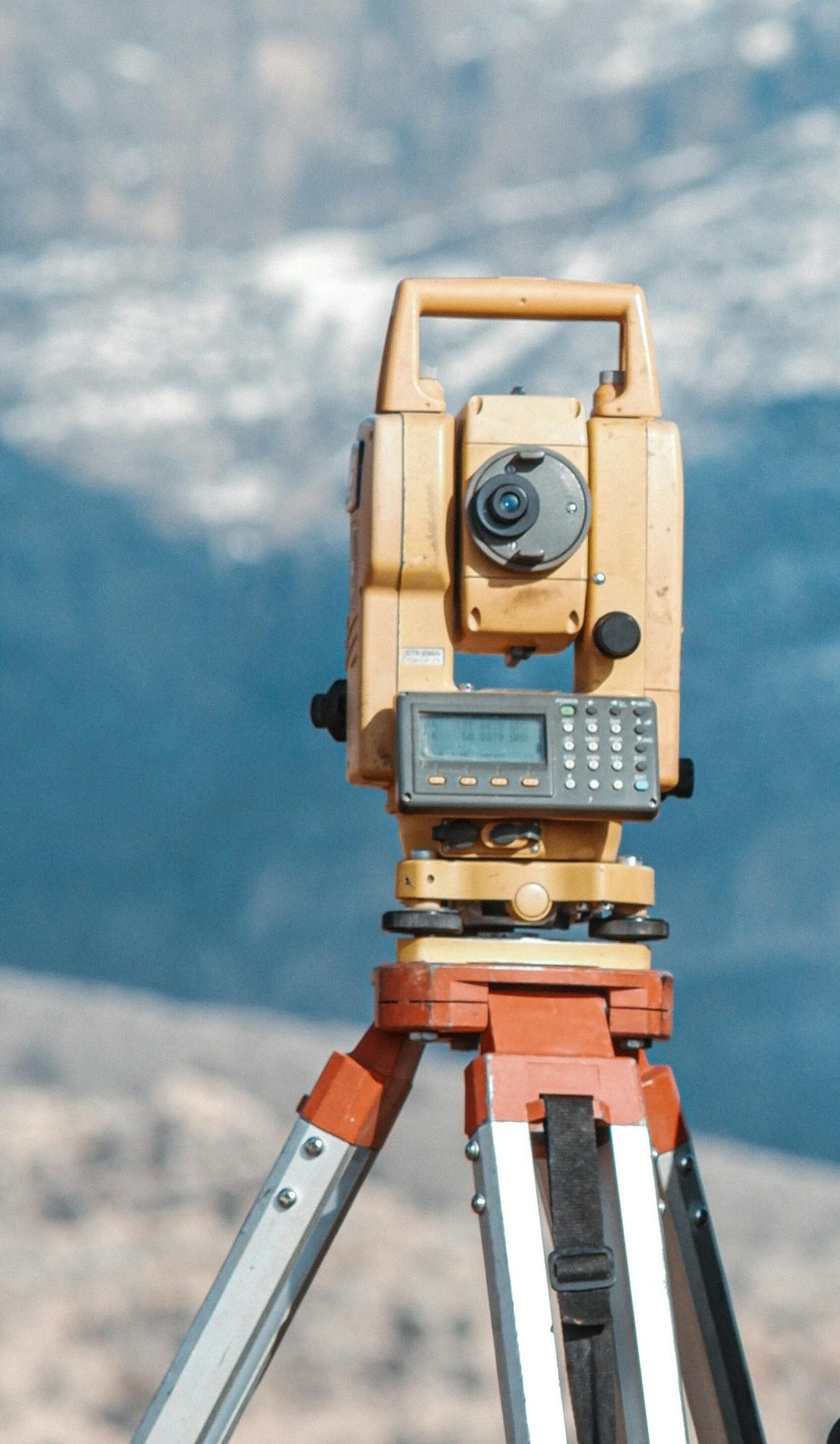 Total station surveying instrument on a tripod